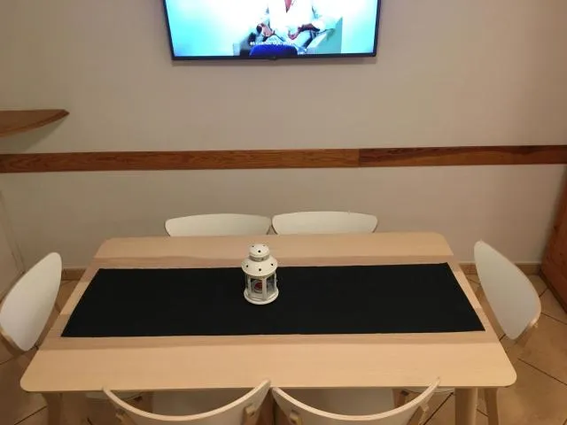  Enjoy Apartment - picture  : TV/entertainment centre,Living room,Dining area,Property 