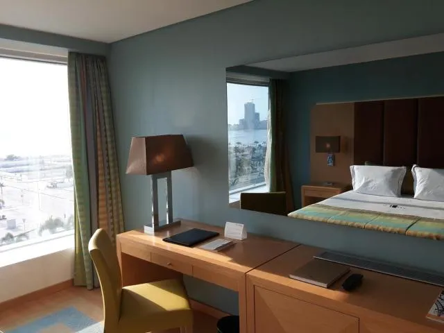  Hotel Presidente Luanda - picture  : TV/entertainment centre,Bed,Bedroom,City view,Property,Room 