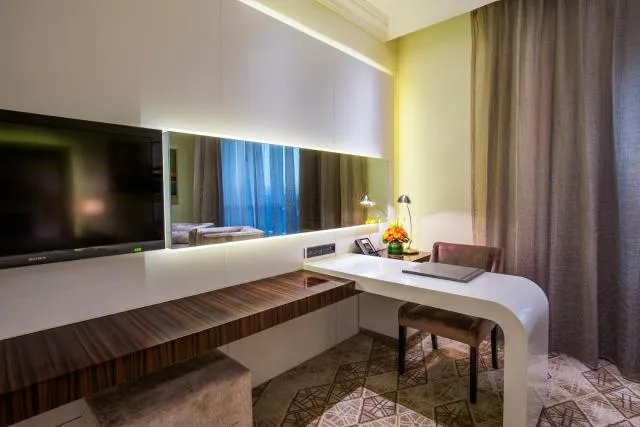  Elite Byblos Hotel - picture  : TV/entertainment centre,Night,TV and multimedia,Decorative detail,Seating area,Property 