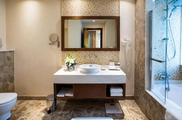  Elite Byblos Hotel - picture  : Shower,Toilet,Bathroom,Day,Bathroom,Bath,heating,towels,Property 