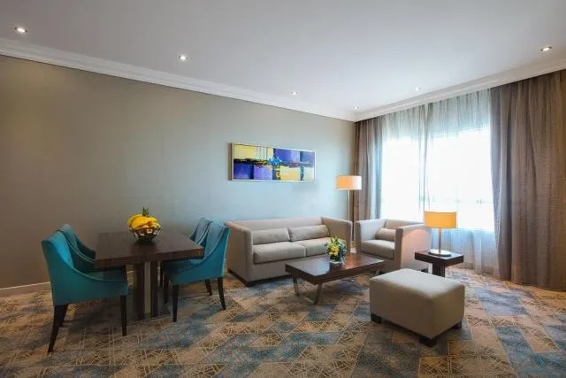  Elite Byblos Hotel - picture  : Seating area,Day,TV and multimedia,Living room,Seating area,Dining area,Family,Property 