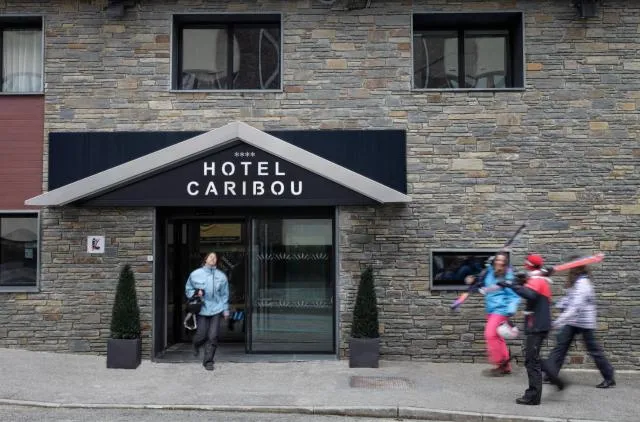  Hotel Caribou - picture  : Facade/entrance,Day,People,Property logo or sign,Property 