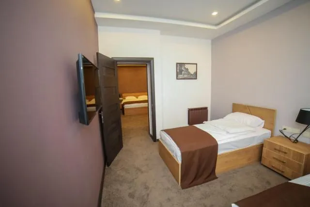  Moscow Boutique Hotel - photo  : Centre de télévision/divertissement,Lit 