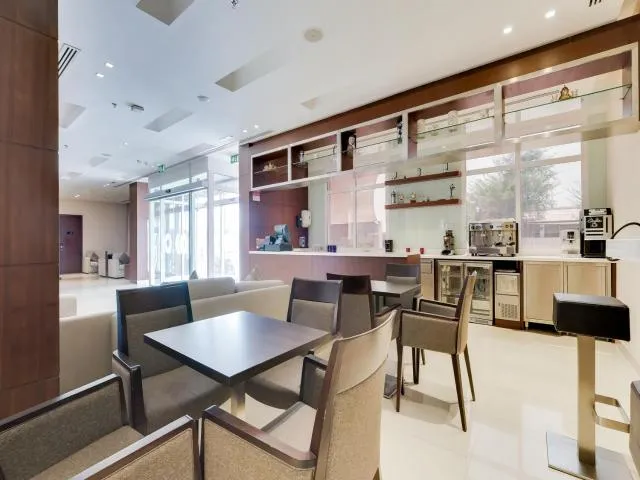  Action Hotel Ras Al Khaimah - picture  : Toilet,Patio,Restaurant/places to eat,Property 