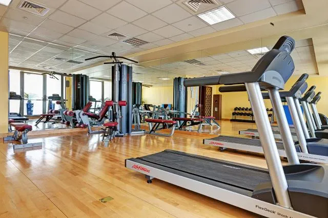  Abidos Hotel Apartment Dubai Land - picture  : Fitness centre/facilities,Fitness centre/facilities,Property 