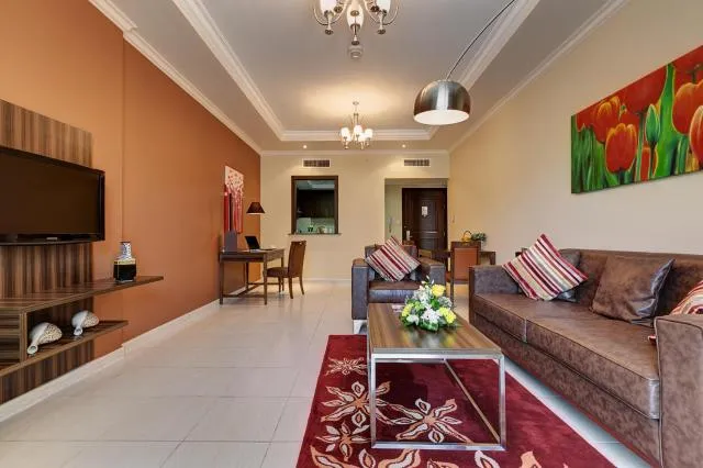  Abidos Hotel Apartment Dubai Land - picture  : Seating area,Living room,Property 