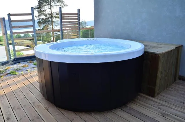  JBX Resort Apartments Lipno - picture  : Hot Tub,Garden view,Property 