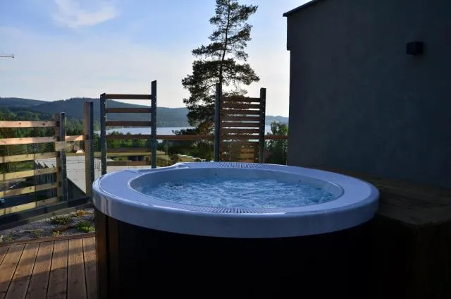  JBX Resort Apartments Lipno - picture  : Hot Tub,Garden view,Property 