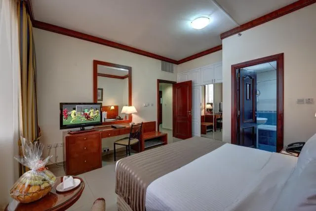  Mourouj Hotel Apartments by Mourouj Gloria - picture  : TV/entertainment centre 