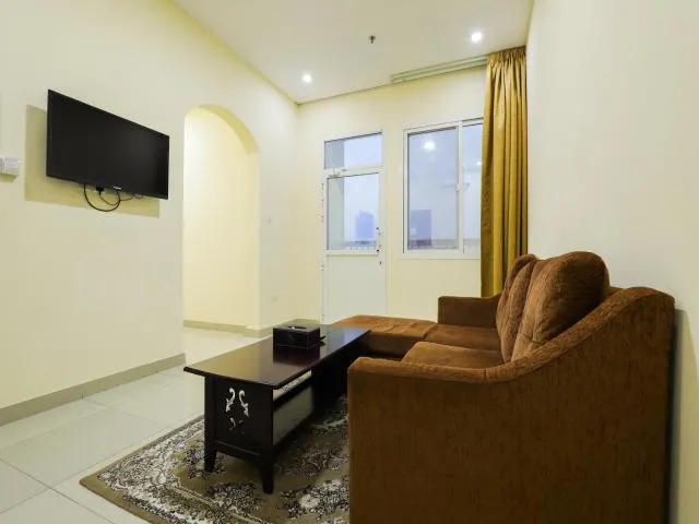  SH Hotel - picture  : Seating area,TV/entertainment centre,Living room,Property 
