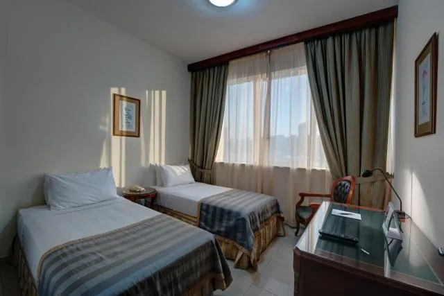  Mourouj Hotel Apartments by Mourouj Gloria - picture  : Bed 