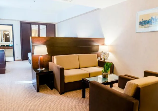  Hotel Polonia Palace - picture  : Seating area,Photo of the whole room,Seating area,Bedroom,Property,Room 