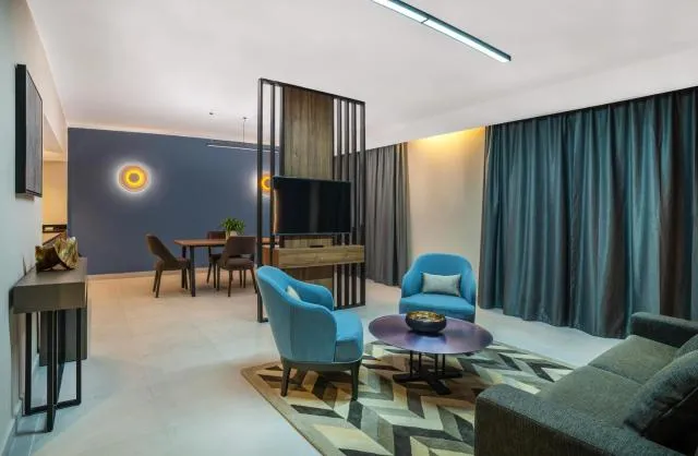  Hotel Holiday International - picture  : Seating area,Seating area,Property 