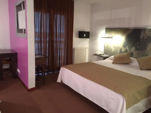  Hotel Folch - picture  : Bed,Bed,View (from property/room),Photo of the whole room,Bedroom,City view,safe,Property,Room 