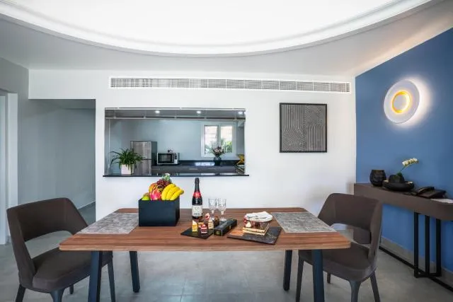  Marbella Resort - picture  : Living room,Lounge or bar,Seating area,Dining area,Drinks,Alcoholic drinks,Property 