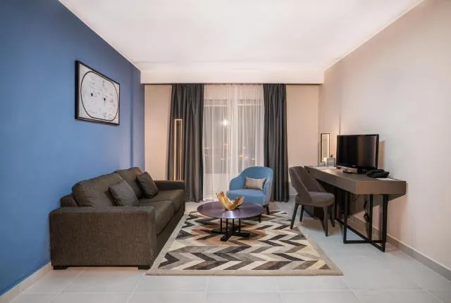  Hotel Holiday International - picture  : Seating area,Living room,Seating area,Property 