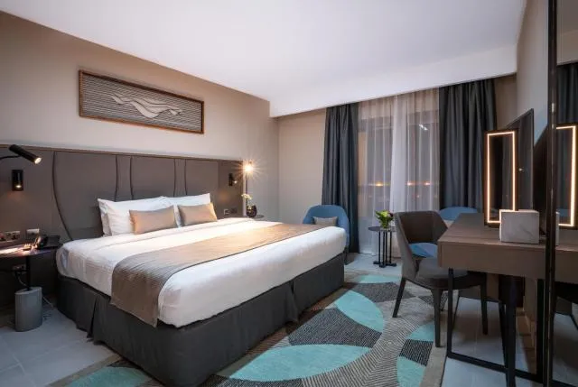  Hotel Holiday International - picture  : Bed,Bedroom,Property 