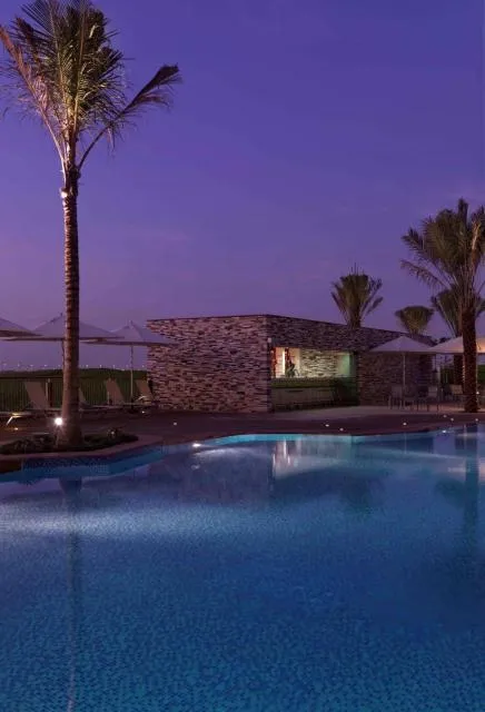  Park Inn by Radisson Abu Dhabi Yas Island - picture  : Property building,Swimming pool,Lounge or bar,Pool view,Swimming pool,Property 
