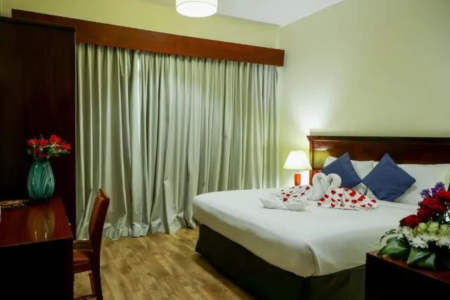  Mermaid Beach Hotel LLC - picture  : Bed,Bedroom,Property 