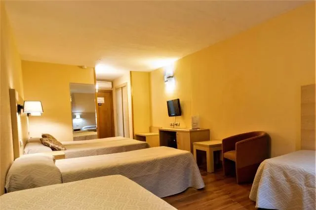  Hotel Panorama - picture  : Bed,TV and multimedia,Photo of the whole room,Seating area,Property,Room 