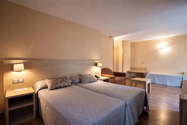  Hotel Panorama - picture  : Bed,Bed,Seating area,Property,Room 