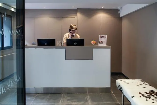  Hotel Caribou - picture  : Nearby landmark,Kitchen/kitchenette,Day,Lobby or reception,On site,Property 