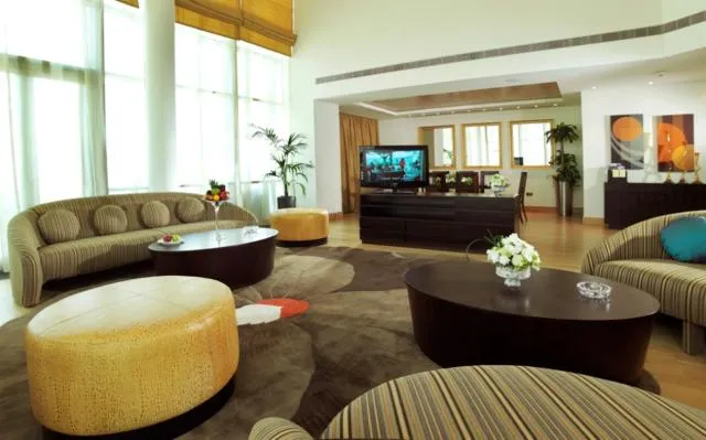  Burjuman Arjaan by Rotana - Dubai - picture  : Nearby landmark,Seating area,Living room,Photo of the whole room,Property,Room 