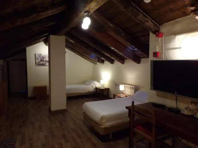  Hotel Roc de St Miquel & Apartment - picture  : TV/entertainment centre,Bed,Photo of the whole room,Room 