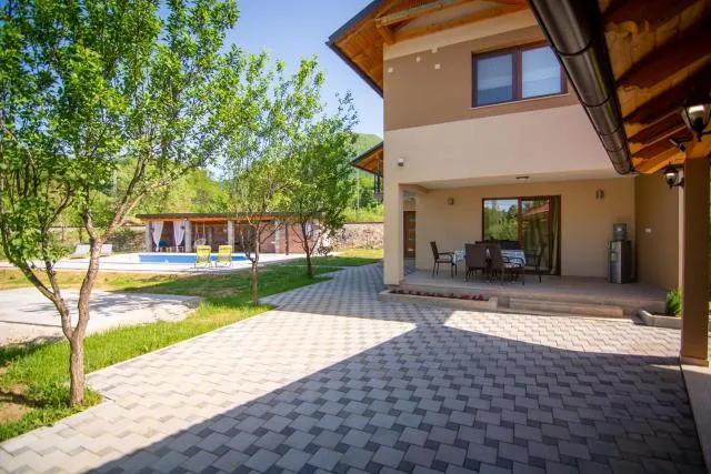  Holiday Home Faruk - picture  : Property building,Swimming pool 