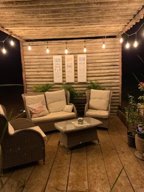  RAK Glamping - picture  : Seating area,Night,Seating area,Evening entertainment,Property 