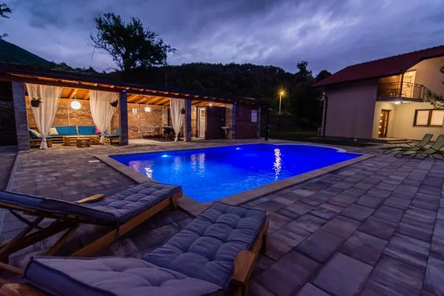  Holiday Home Faruk - picture  : Property building,Swimming pool 