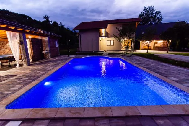  Holiday Home Faruk - picture  : Property building,Swimming pool 