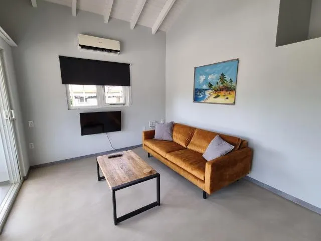  Casa Korsou - photo  : Zone assise,Centre de télévision/divertissement,Télévision et multimédia,Salon,Zone assise,climatiseur,Propriété 