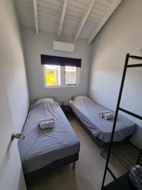  Casa Korsou - photo  : Lit,Lit,Chambre à coucher,climatiseur,Propriété,Chambre 