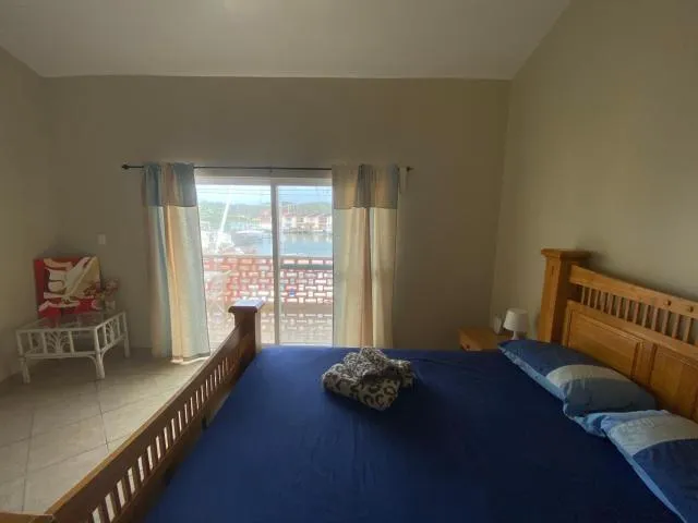  Antigua chiama Italia villas - picture  : Bed,Bed,View (from property/room),Photo of the whole room,Bedroom,Sea view,Property,Room 