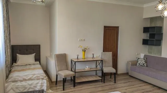  Harmonia Garden Garni - picture  : Seating area,Bed,Living room,Photo of the whole room,Seating area,hair dresser,Property,Room 