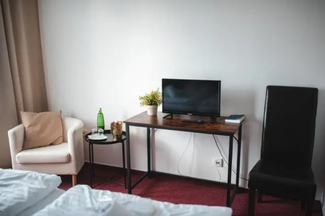  Hotel Lucia - picture  : Seating area,TV/entertainment centre 