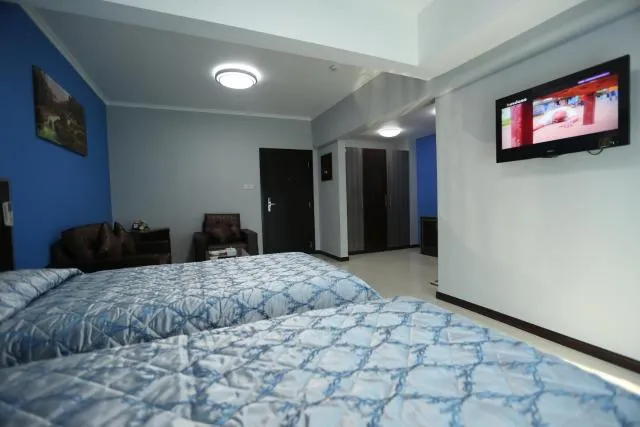  Panorama Hotel Bur Dubai - picture  : TV/entertainment centre,Bed,Bedroom,Property 