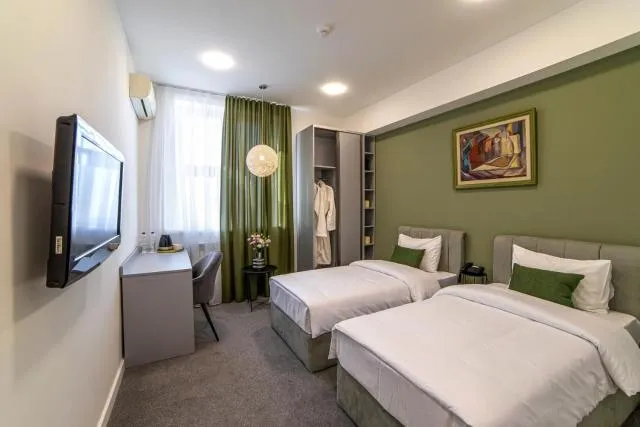  Aurora Hotel By Benefice - picture  : Bed,TV and multimedia,Photo of the whole room,Bedroom,Property,Room 