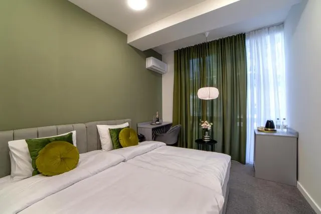  Aurora Hotel By Benefice - picture  : Bed,Bed,Bedroom,Property,Room 