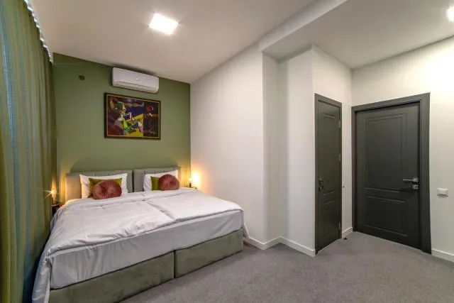  Aurora Hotel By Benefice - picture  : Bed,Bed,Bedroom,Property,Room 