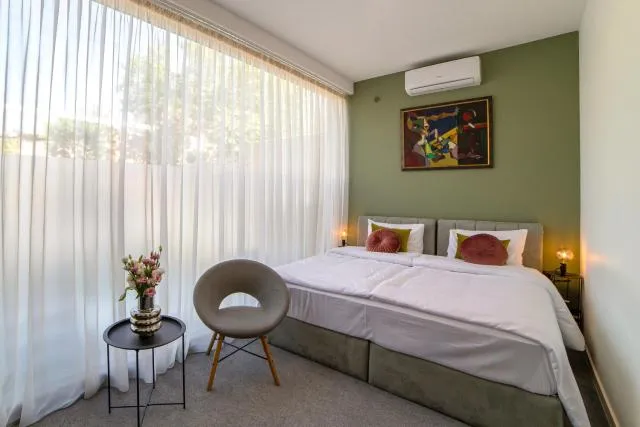  Aurora Hotel By Benefice - picture  : Bed,Bed,Bedroom,Property,Room 