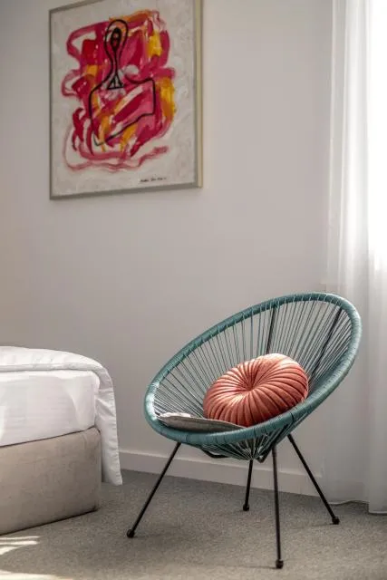  Aurora Hotel By Benefice - picture  : Seating area,Bedroom,Property 