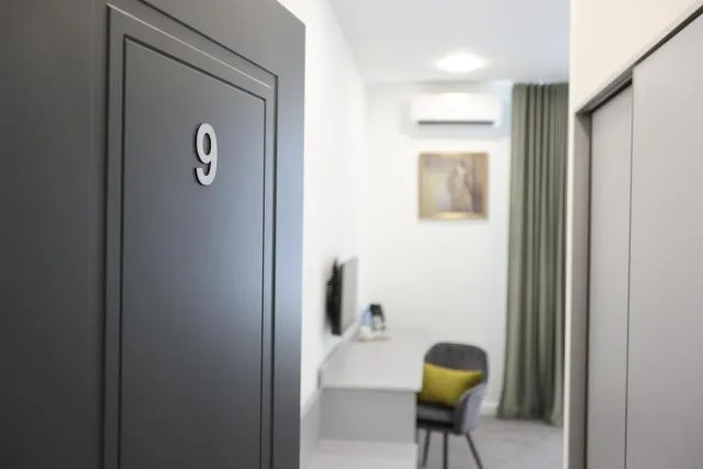  Aurora Hotel By Benefice - picture  : Seating area,TV/entertainment centre,TV and multimedia,Property 