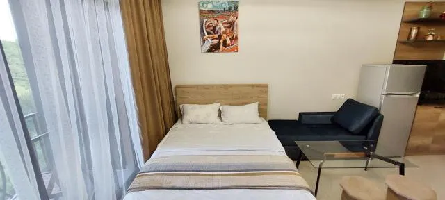  Via Tsaghkadzor - picture  : Bed,Bed,Living room,Photo of the whole room,Seating area,Bedroom,Property,Room 