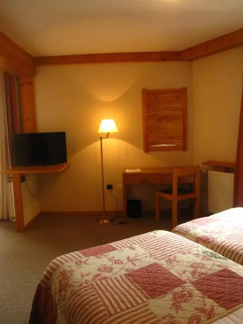  Hotel Bonavida - picture  : TV/entertainment centre,Bed,Bedroom,Property 