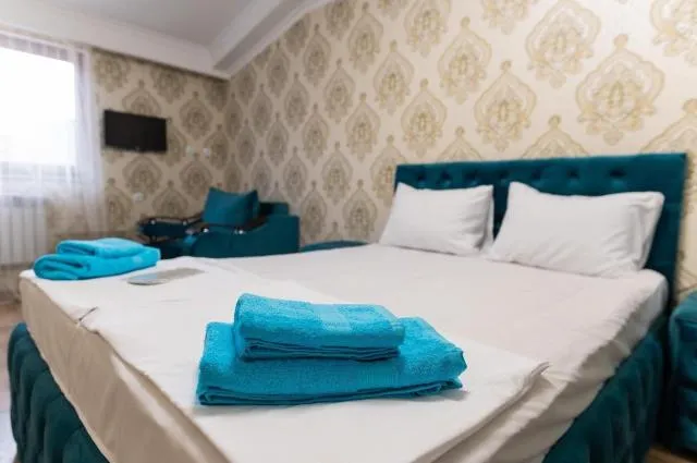  Hovasapyan's Family Guest House - picture  : Bed,Bed,Bedroom,towels,Property,Room 