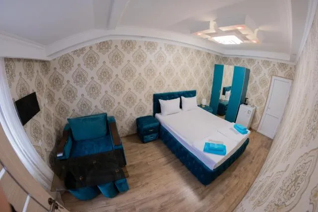  Hovasapyan's Family Guest House - picture  : Bed,Bed,TV and multimedia,Bedroom,towels,Property,Room 