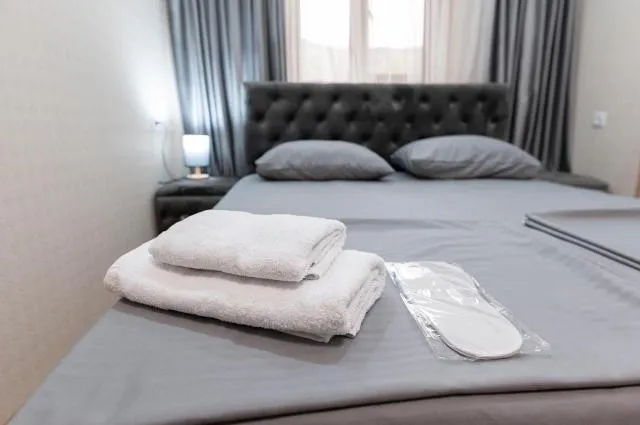  Hovasapyan's Family Guest House - picture  : Bed,Bed,Photo of the whole room,Bedroom,towels,Property,Room 