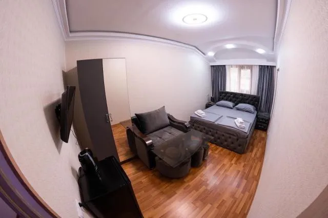  Hovasapyan's Family Guest House - picture  : Seating area,TV and multimedia,Living room,Photo of the whole room,Bedroom,Property,Room 